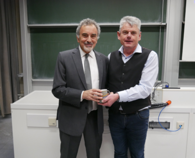 Ioannis Economou and Andreas Paul Fröba after the talk of Ioannis at the CBI Colloquium in December 2025 (photo: Elena Schultz)